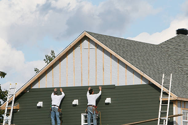 Professional Siding Installation technician working in Westernport, MD